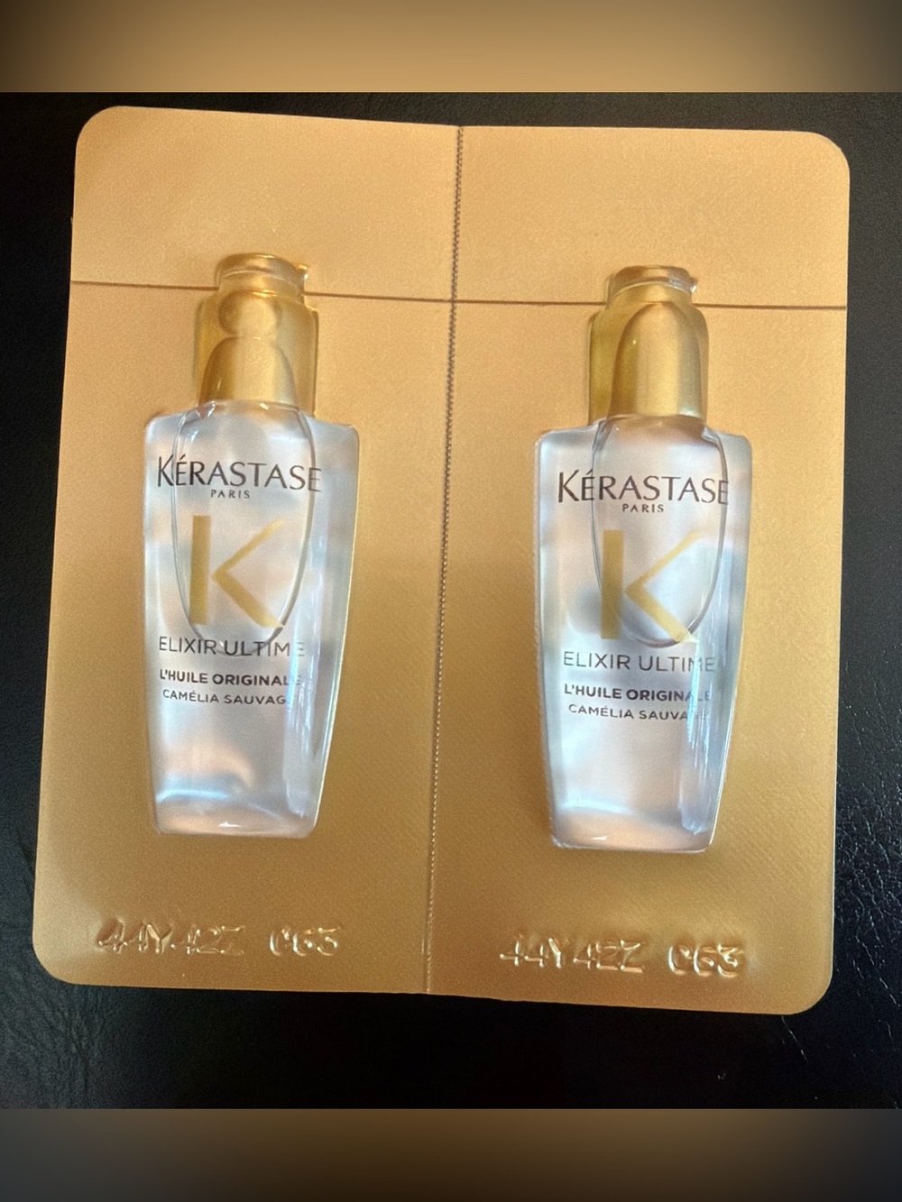 Kerastase Elixir Ultime Serum Duo in Gold and Clear Bottles